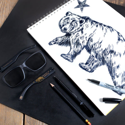 black polarized sunglass for men with a sketch of a bear