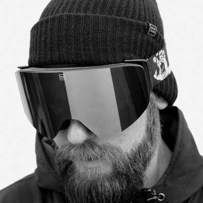 Man wearing a pair of anti fog ski goggles